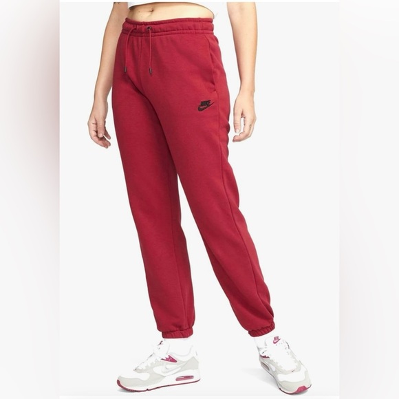 Nike Pants - NWT Nike women’s XL pomegranate red mid rise loose fit joggers